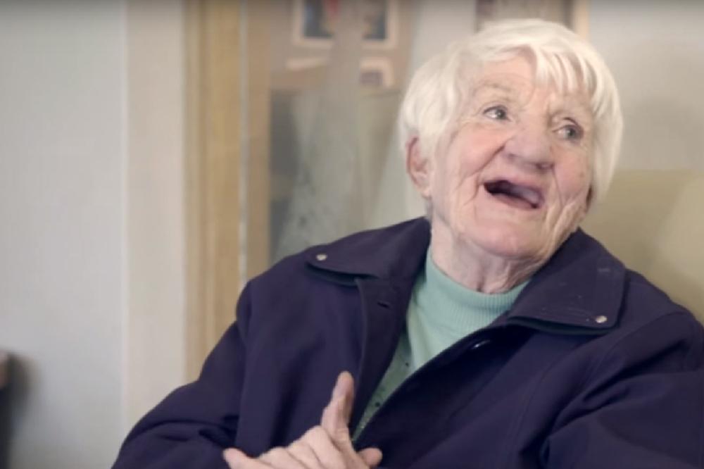 Elderly woman laughing