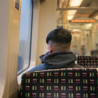 Photo of a young person commuting